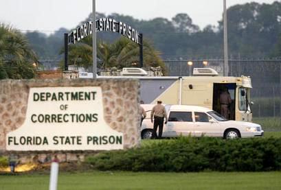 A hearse carrying the body of Paul Hill leaves the Florida State Prison following his execution on Wednesday, Sept. 3, 2003, in Starke, Fla. Hill was executed for the 1994 shotgun slayings of abortion doctor John Britton and his escort James Barret outside a Pensacola, Fla., abortion clinic. Hill was the first person put to death in the United States for anti-abortion violence. (AP Photo/Scott Audette)